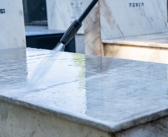 Cleaning and repainting graves