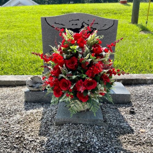 Flower bouquet on the grave
